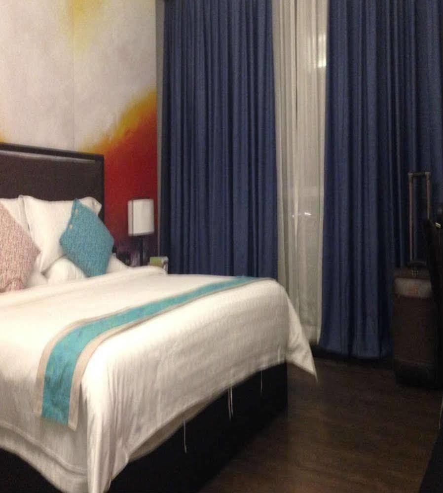 Sotel Inn Hotel San Yuan Li Branch Canton Extérieur photo